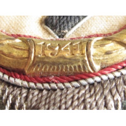 Cruz alemana en oro. Tela.