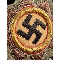 Cruz alemana en oro. Tela.