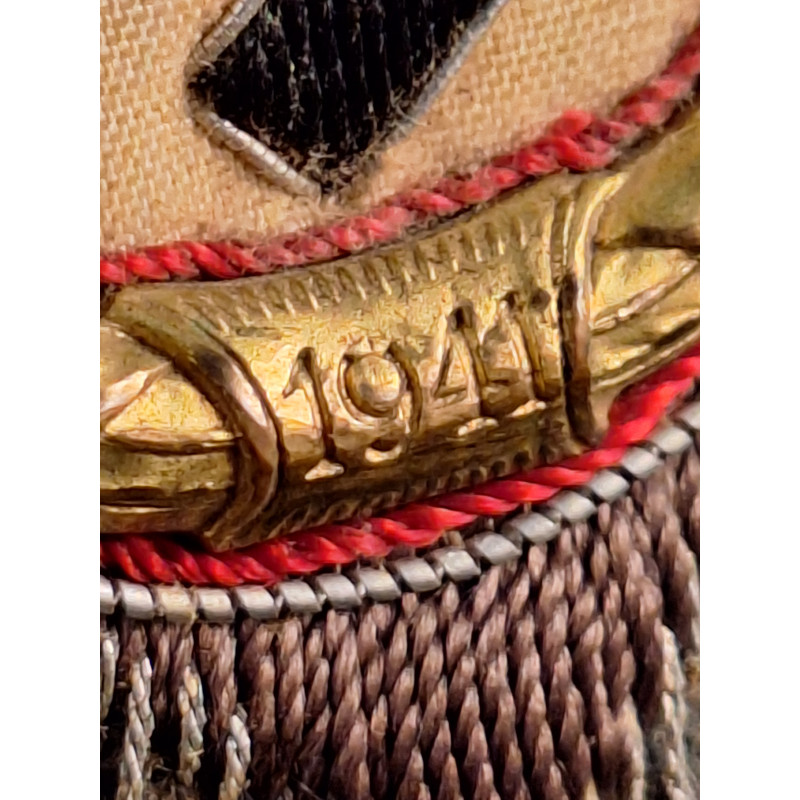 Cruz alemana en oro. Tela.