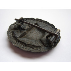 Placa de herido en negro