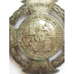 Medalla Don Carlos. Plata.